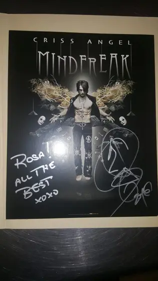 A Criss Angel Mindfreak poster signed to Rosa